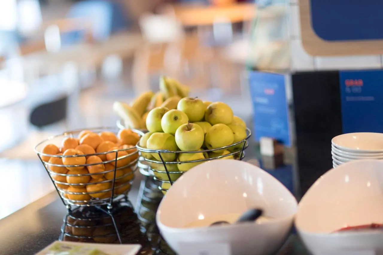 two baskets of fruit sitting on a table at Holiday Inn Express Aberdeen City Centre by IHG in Aberdeen